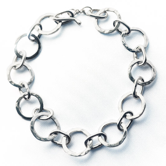 Sterling silver hammered link bracelet “Dancing Lights”