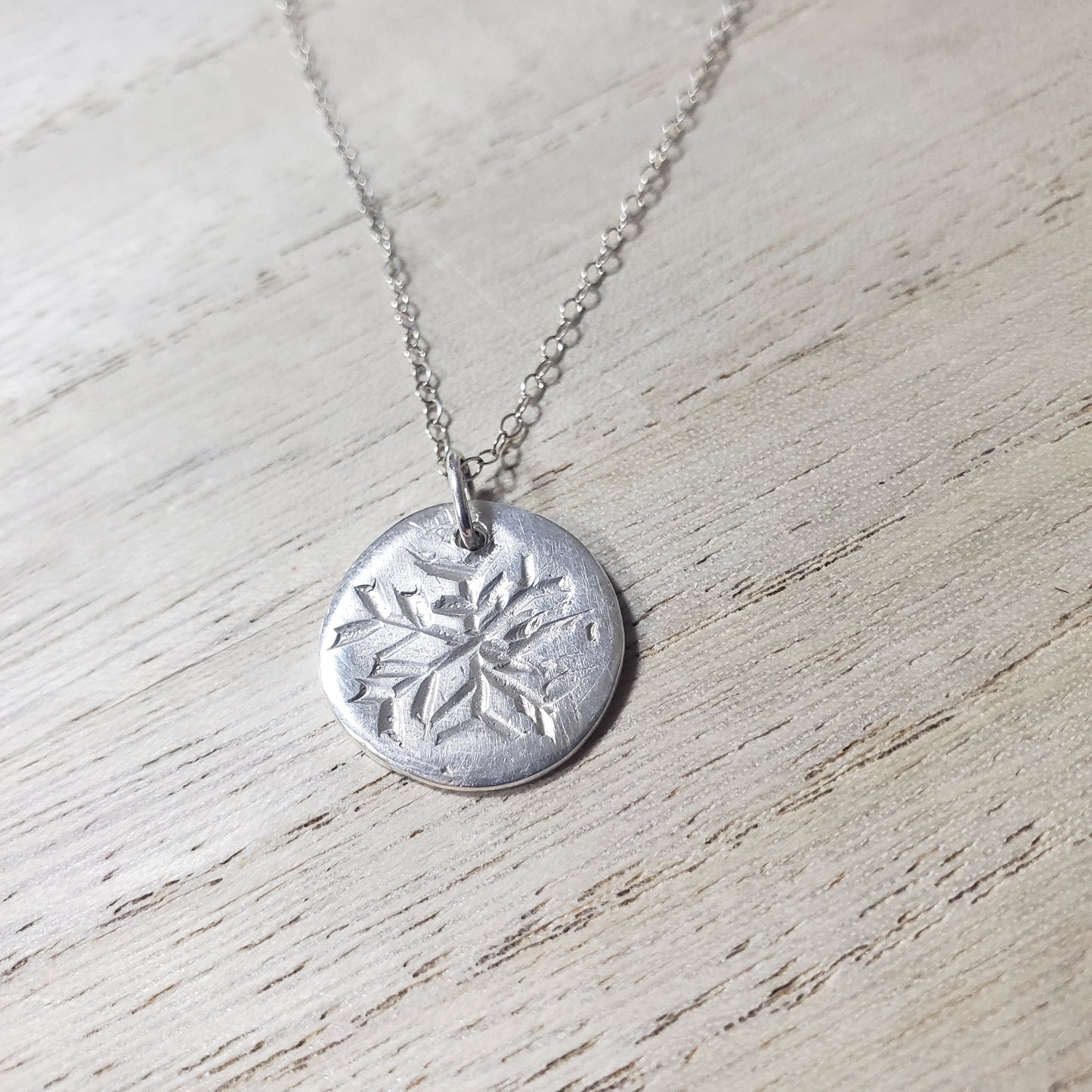 Hand carved organic snowflake fine silver necklace