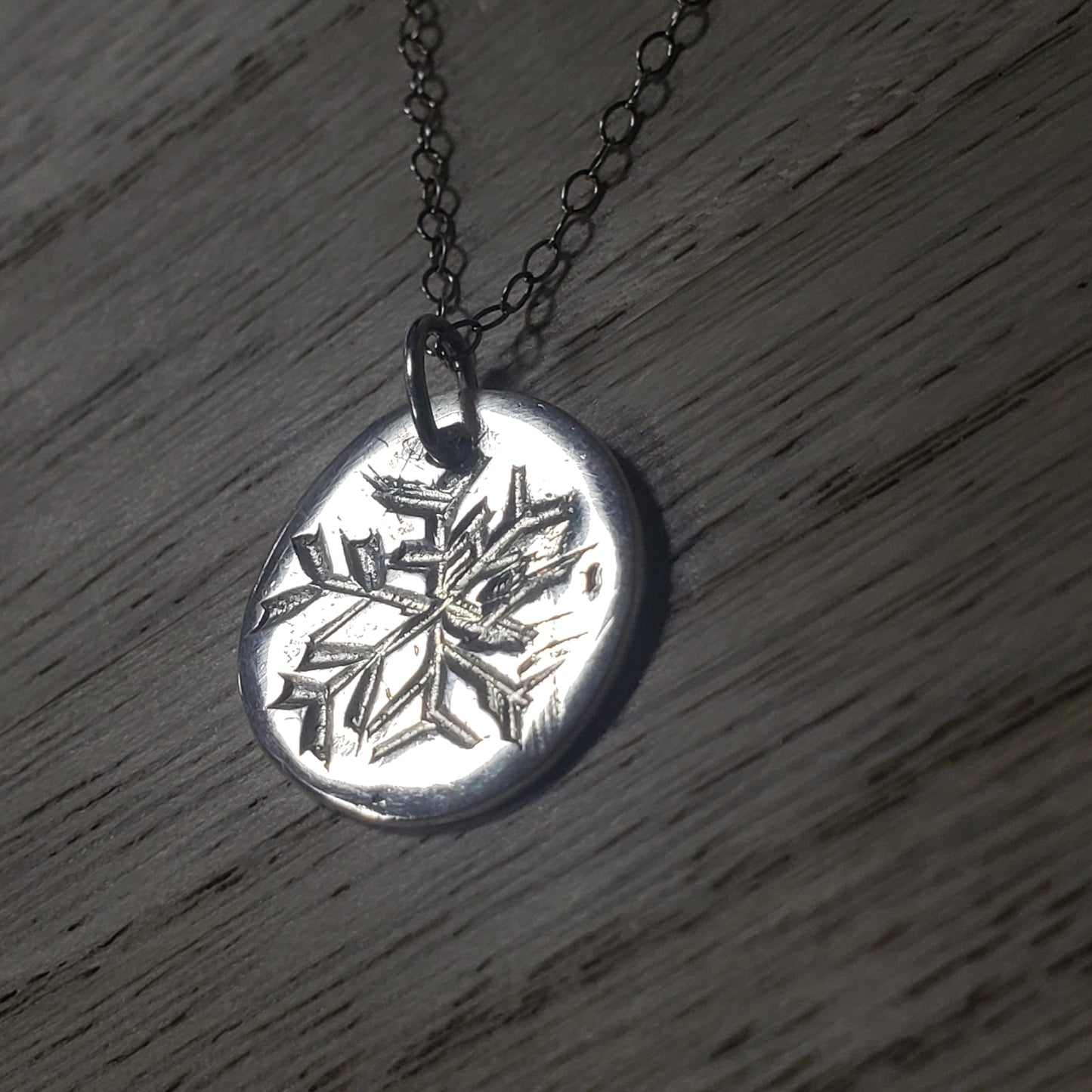 Hand carved organic snowflake fine silver necklace