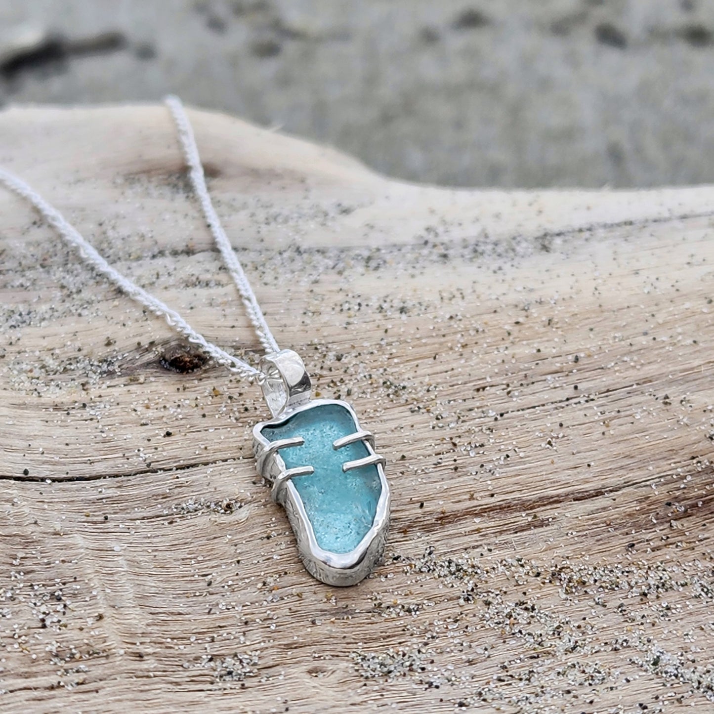 Sterling silver and blue sea glass necklace