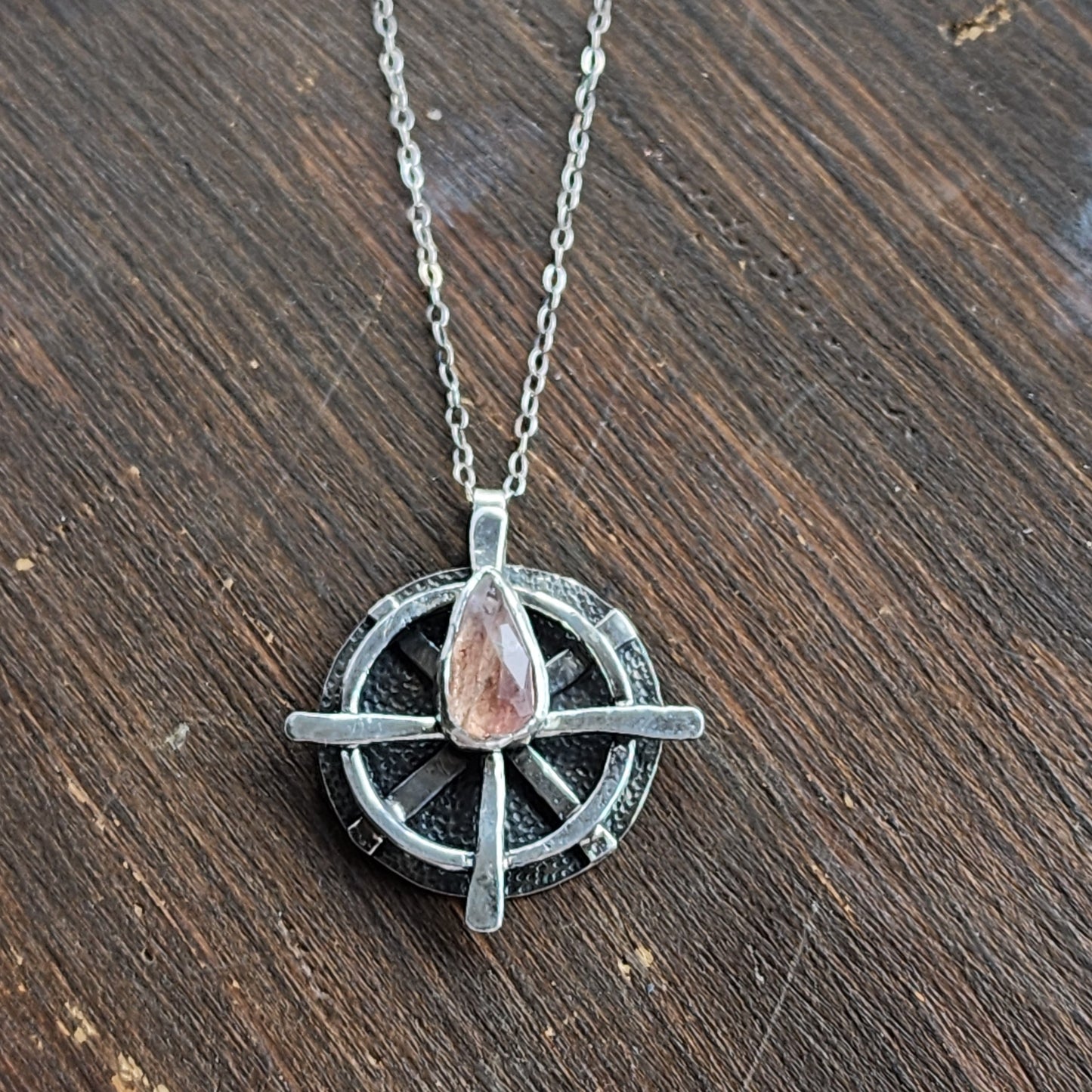 Compass style necklace with pink tourmaline arrow gemstone