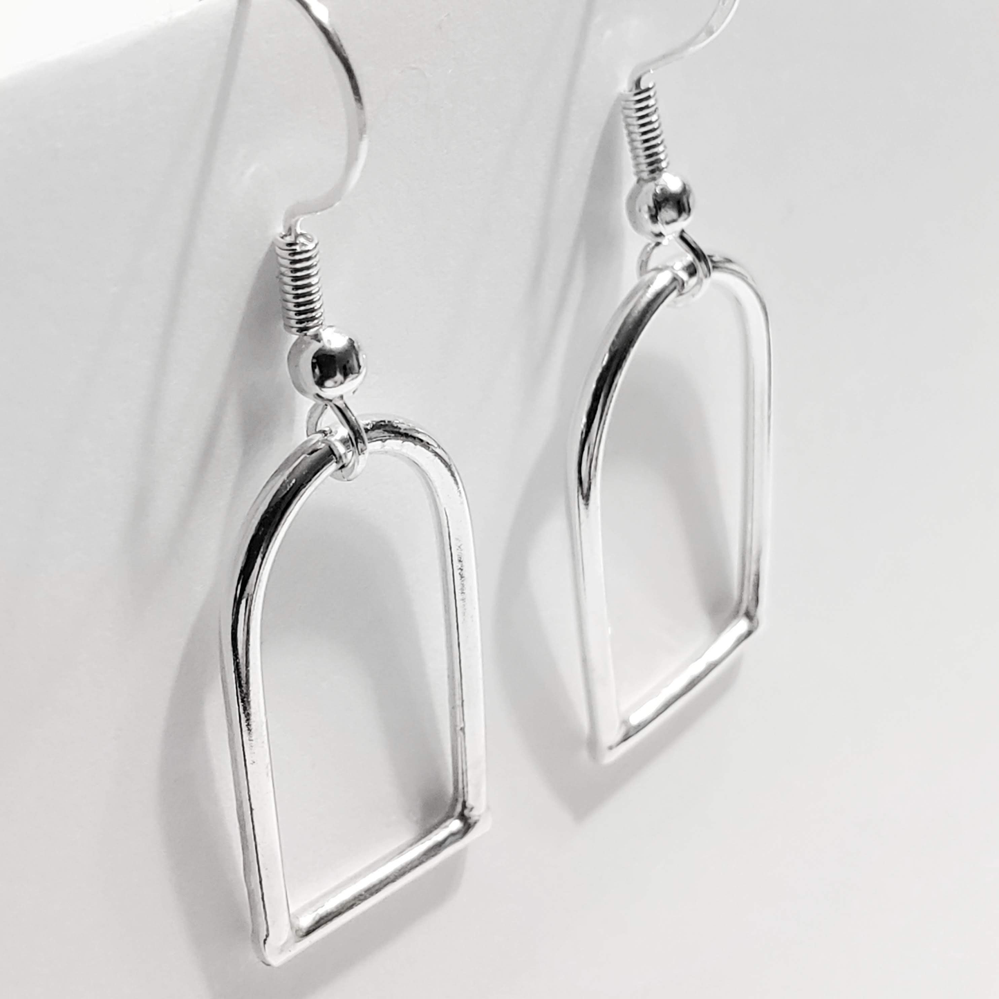 Sterling silver open form dangle earrings