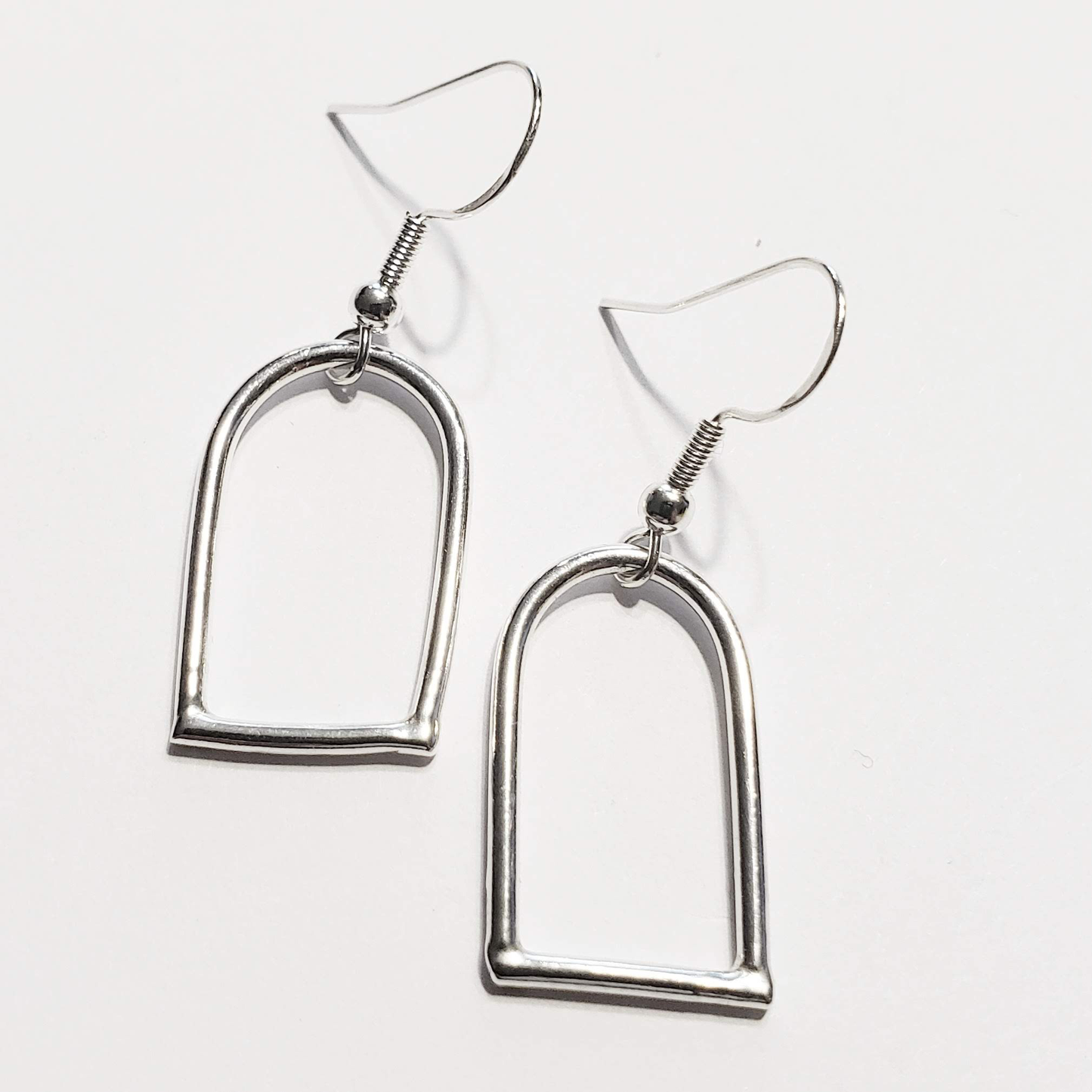 Sterling silver open form dangle earrings